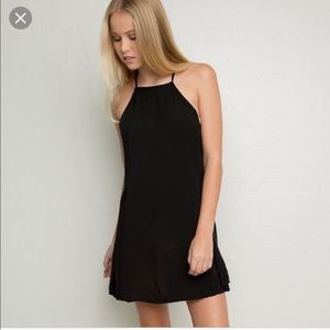Little black dress: high neck suede dress